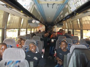 the children warmed up for their concert on the bus and got to hear a little bit about the ministry of Intermountain from Chaplain Chris